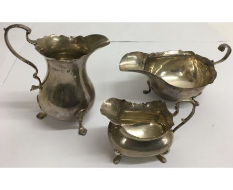 A silver cream jug and two sauce boats, approx 296g