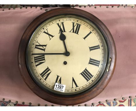 A Victorian circular wall clock.