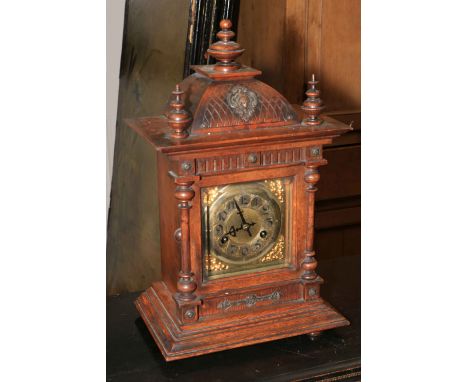 Vintage ornate oak mantel clock with gilt metal dial, 45cm high.