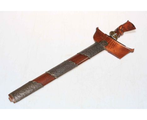 South East Asian wavy blade Kris with wooden scabbard