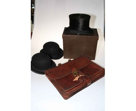 Two hunting bowler hats, top hat in box and 'The Bridge' leather briefcase with key.