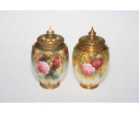 Two Royal Worcester pierced lid painted pot pouri vases, signed Spilsbury and M Hunt, 17cm high