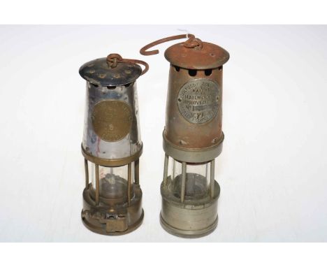 Two miners lamps by Protector Lamp Co. and Hailwood &amp; Ackroyd