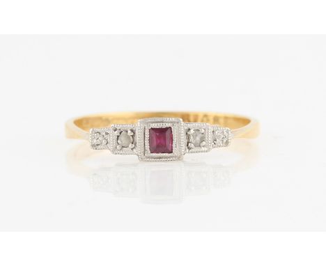 A ruby and diamond three stone ring, set with a central square cut ruby, flanked to either side with a rose cut diamond, in s