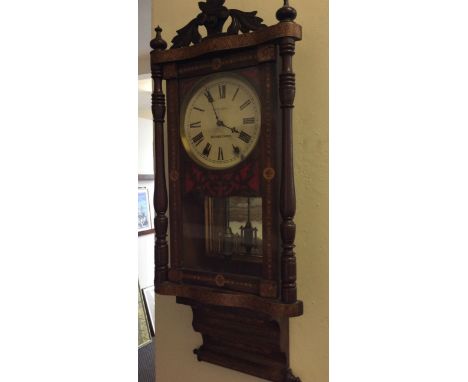 A W. C. Liddell rosewood inlaid wall clock