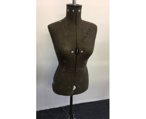 A brown Chil-Daw dressmakers mannequin.