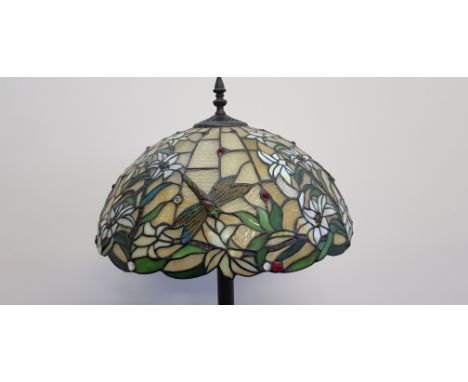 A Standard lamp with Tiffany's style lamp shade