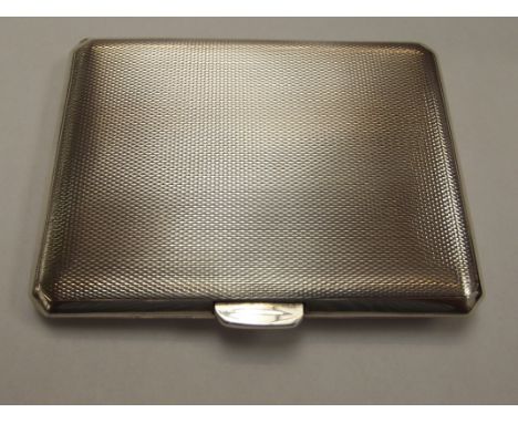 Silver engine turned cigarette case with gilded interior. Fully hallmarked maker Frederick Field Ltd dated 1939. Good all rou