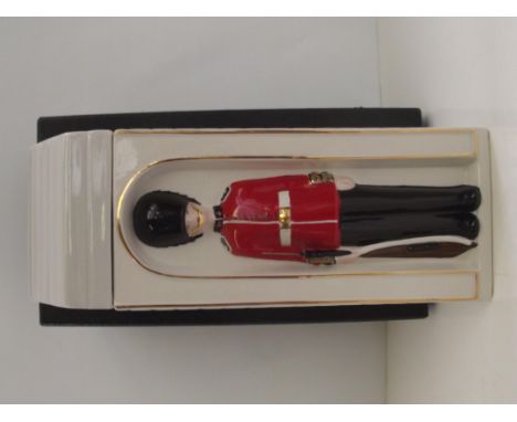 Cased Mason's Ironstone decanter in the form of a Queen's Guard at his post, height 25cm
