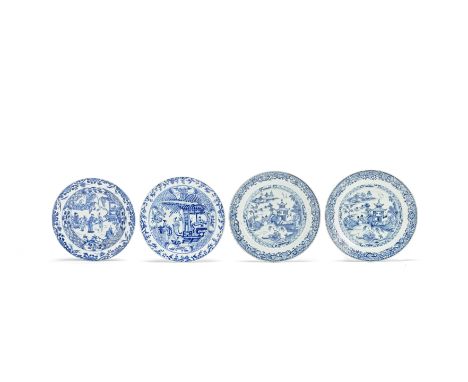 Four blue and white export dishesKangxi and 18th centuryTwo depicting narrative scenes and a further pair with pavilions in r