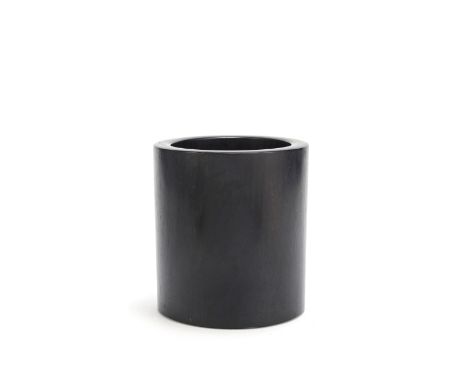 A zitan brushpot, bitong20th centuryOf cylindrical form with thick straight sides, the base with a central circular plug, the