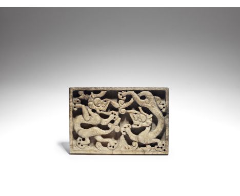 A jade 'dragon' plaqueMing DynastyOf rectangular form, carved in relief with an ascending and descending dragon above foaming