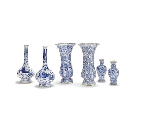Three pairs of blue and white vasesKangxiComprising: a pair of faceted pear-shaped beakers painted with peonies, chrysanthemu