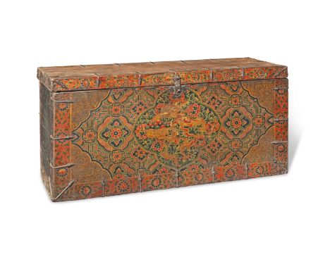 A painted and lacquered wood 'dragon' storage chestTibet, 17th/18th centuryDecorated to the front with a quatrefoil panel enc