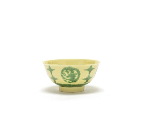 A yellow-ground green-enamelled 'dragon medallion' bowlKangxi six-character mark and of the periodThe thinly-potted vessel ri