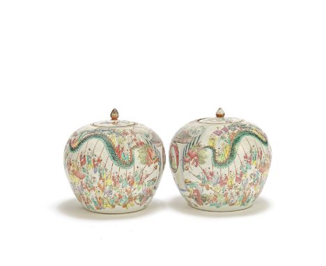 A pair of famille rose 'boys' jars and coversLate Qing Dynasty Each painted with festival scenes with boys variously parading