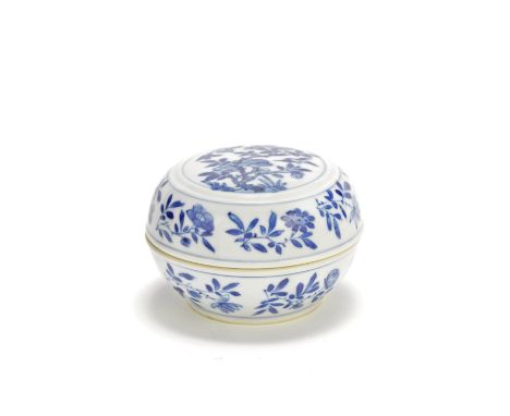 A blue and white 'floral' box and coverKangxiThe cover with birds amongst flowering branches, within borders of flowering, le