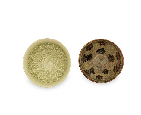 A carved Yaozhou bowl and a Jihou papercut 'prunus bowl'Song DynastyThe first of conical form, moulded to the interior with a