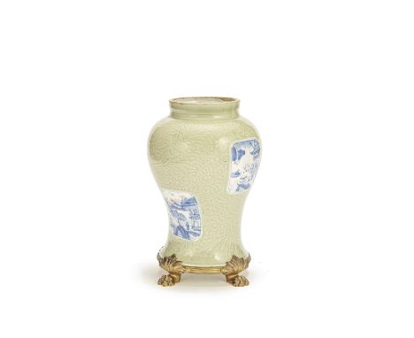 A carved celadon-glazed underglaze blue and copper-red baluster vaseKangxiDecorated with panels of figures on horseback and b