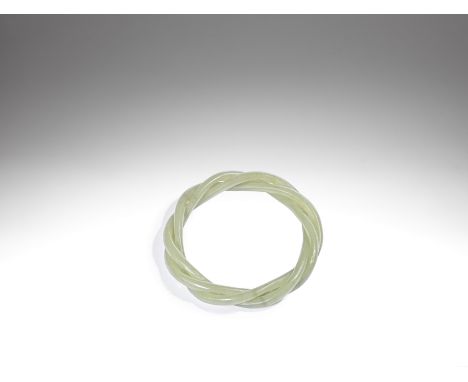 A green jade rope-twist bangle19th centuryFormed from three intertwined strands. 8cm (3.1/8in) wide.For further information o