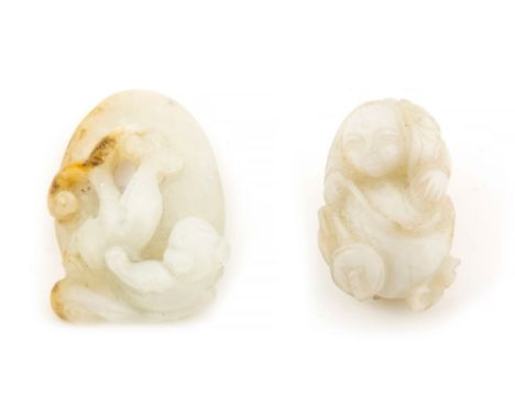 A small jade carving of Liu Hai , wearing loosely draped robes  A small jade carving of Liu Hai  , wearing loosely draped rob