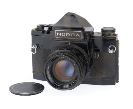 black, serial number 735489, body F, dents to prism cover, some paint wear, shutter working, slow speeds inaccurate, with a N