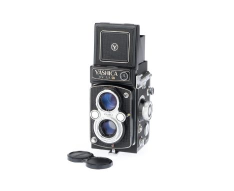 black, body G, advance works, shutter not firing, light meter not responding, with f/3.5 80mm lens, optics G, with lens cap.