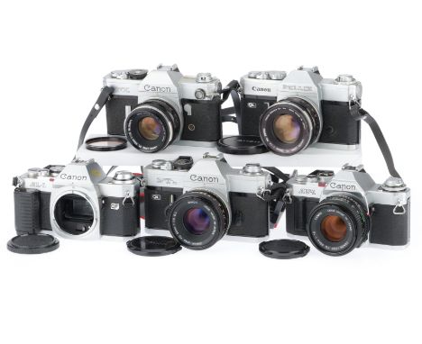 comprising a Canon AV-1, silver, body G, shutter works, meter responds to light, accuracy not checked, with a FD f/1.8 50mm l
