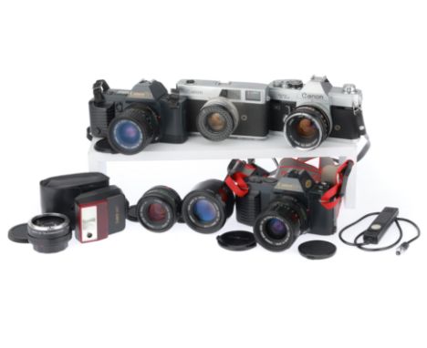 comprising a TL QL, silver, body G, shutter working, with an FD f/1.8 50mm lens, barrel VG, optics VG, a T70, body F-G, batte