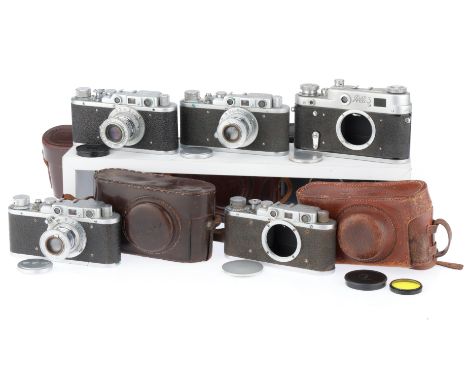 comprising,a FED 1g, serial number 710327, silver, body G, shutter works, rangefinder works, with an Industar-22 f/3.5 50mm l