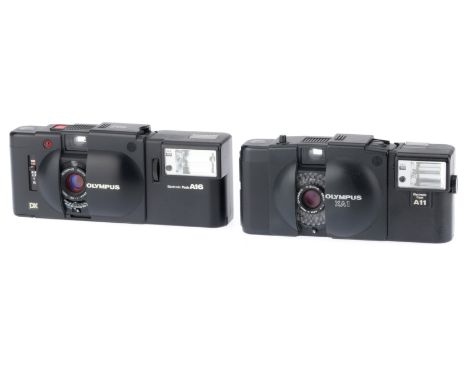 the XA4, black, body G, shutter works, metering responds to light, A16 flash working, the XA1, black, body G, shutter works, 