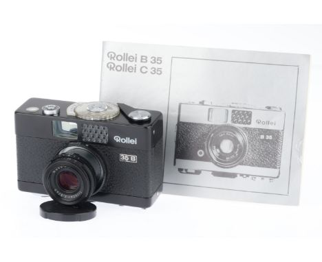 black, body VG, shutter works, advance works, meter responds to light.
