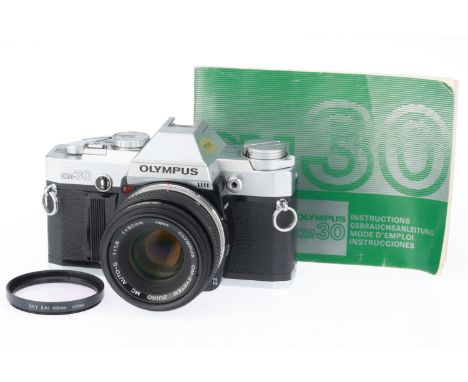 silver, serial number 1134931, body VG, with batteries inserted the shutter works, metering responds to light, with a Zuiko f
