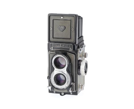 grey, serial number 2129211, body, a little lifting of leatherette, shutter works but needs attention, optics F with haze.