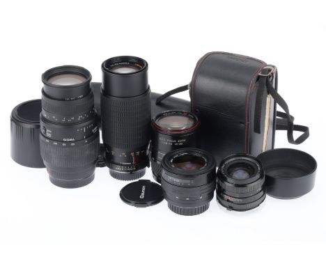 comprising a Sigma 70-300mm, barrel G, optics F with light fungus, a Sigma 35-70mm, barrel G, optics G, and Ozunon 28-80mm, b