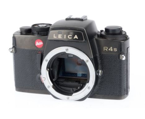 black, serial number,1640165, body G, shutter works but after a lag.