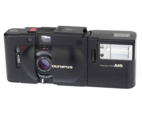 black, serial number 5663997, body G, usage marks to rear, shutter works, metering responds to light, rangefinder patch clear