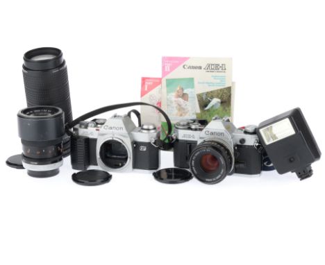 comprising an AE-1, body G, shutter jammed, and an AL-1 QF, body F, battery door faulty, with lenses FD f/1.8 50mm S.C., barr