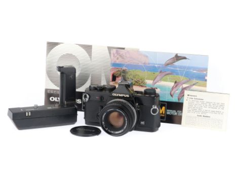 black, serial number 1269032, body F-G, brassing to top and bottom plate, shutter works, needle respons to light, with Zuiko 