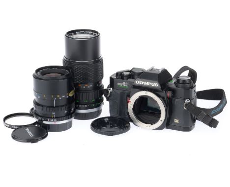 comprising an OM40 body, black, VG, shutter works, metering responds to light, with a Zuiko f/4 75-150 zoom lens, barrel VG, 