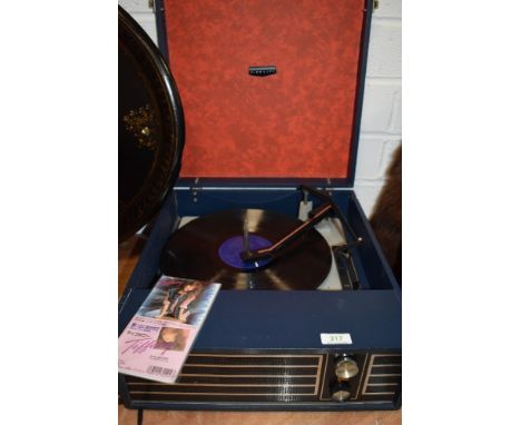 A vintage Fidelity portable record player.