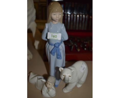 A selection of figures by Lladro and Nao including Polar bear and Angel