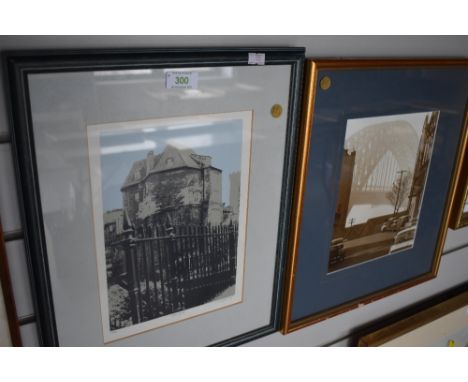 Two photographic prints.