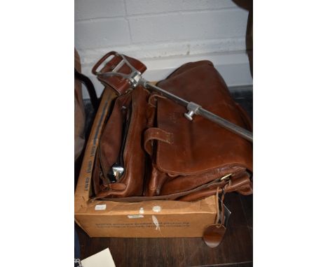 Two woodlands leather bags as new with tags and a shooting stick.