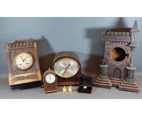 A 19th Century oak Gothic revival mantle clock case together with various other clocks and parts 
