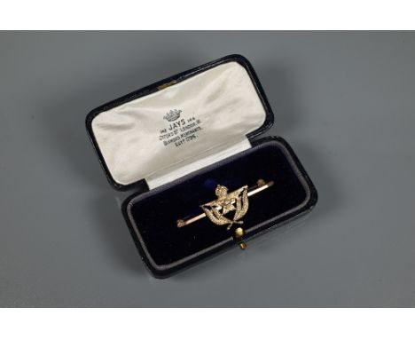 A 9ct yellow gold RAF wings bar brooch, 4.5 cm long, approx 4g all in (replacement pin?), cased 
