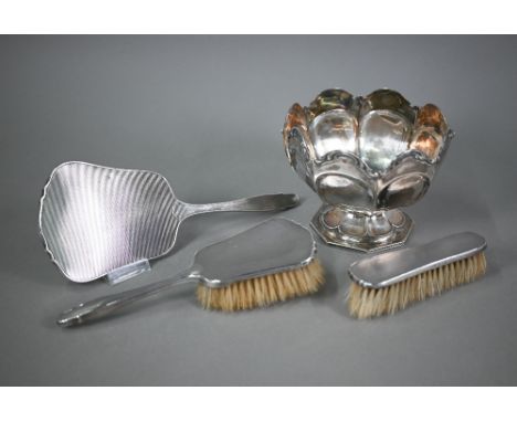 An Edwardian silver rose-bowl, Sheffield 1908, 9.4oz (af), to/w an engine-turned three-piece brush set, Birmingham 1947/48 