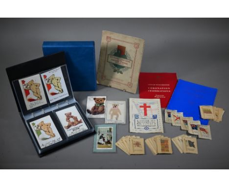 A collection of Kensitas cigarette silks, to/w an album of vintage teddy bear-themed postcards, two royal souvenir programmes