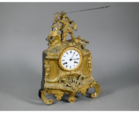 A 19th century ormolu 8-day mantel clock, surmounted by a spear wielding warrior with white enamelled dial, 33 cm h o/all 