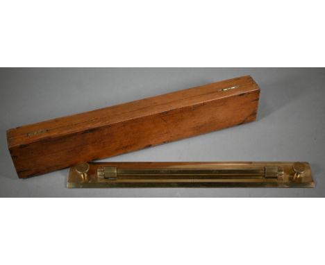 A vintage brass rolling ruler by UWW, Birmingham, 46 cm in stained pine case 